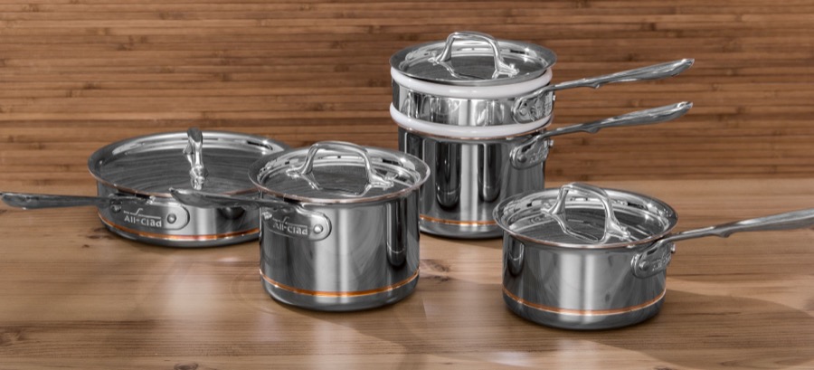 All-Clad D3 stainless steel cookware set on stovetop